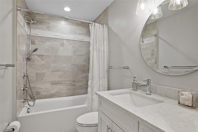 bathroom with toilet, shower / bath combination with curtain, and vanity