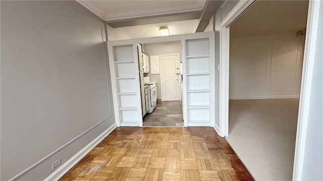 hallway featuring a decorative wall