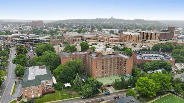 birds eye view of property with a view of city