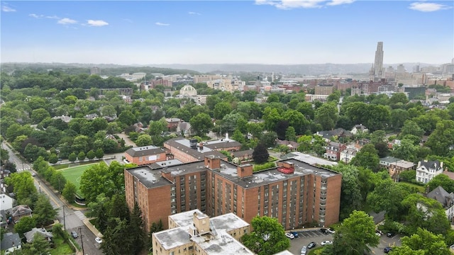 birds eye view of property with a view of city