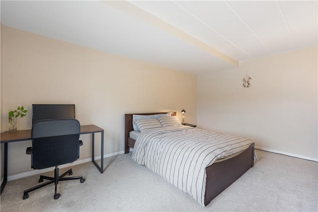 bedroom featuring carpet floors and baseboards