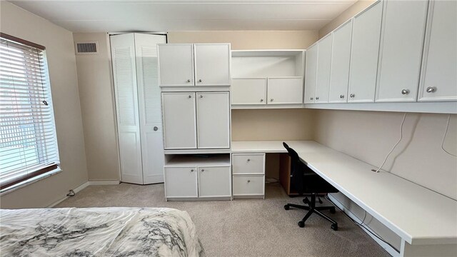 5 Bayard Rd Unit 113, Shadyside, PA 15213 - unfurnished bedroom with light colored carpet, multiple windows, built in study area, and visible vents