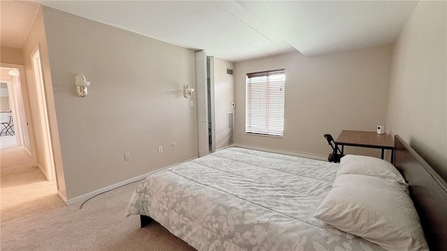 bedroom featuring carpet flooring, visible vents, and baseboards