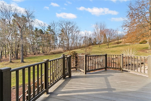 wooden deck with a yard