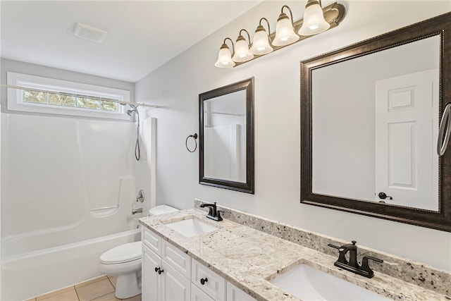 full bathroom with tile patterned flooring, a sink, toilet, and double vanity