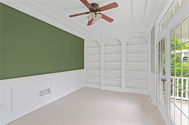 103 Ridgemont Dr, Cranberry Twp, PA 16066 - empty room with light carpet, a ceiling fan, and a decorative wall