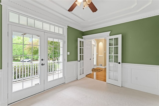 103 Ridgemont Dr, Cranberry Twp, PA 16066 - doorway to outside featuring french doors, carpet, a ceiling fan, a wainscoted wall, and a tray ceiling