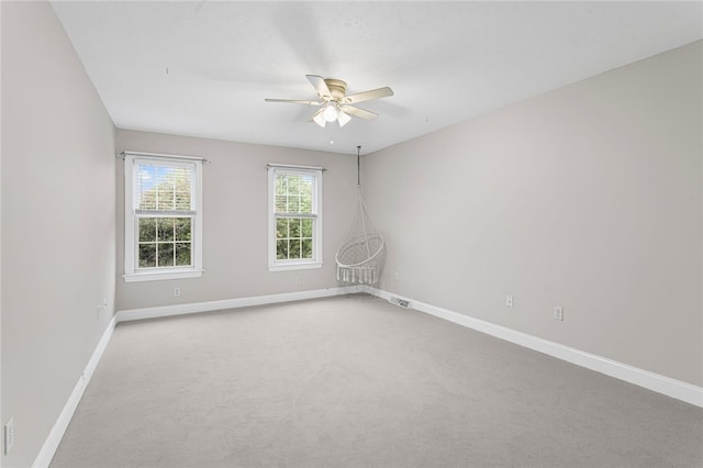 103 Ridgemont Dr, Cranberry Twp, PA 16066 - carpeted spare room with baseboards and a ceiling fan