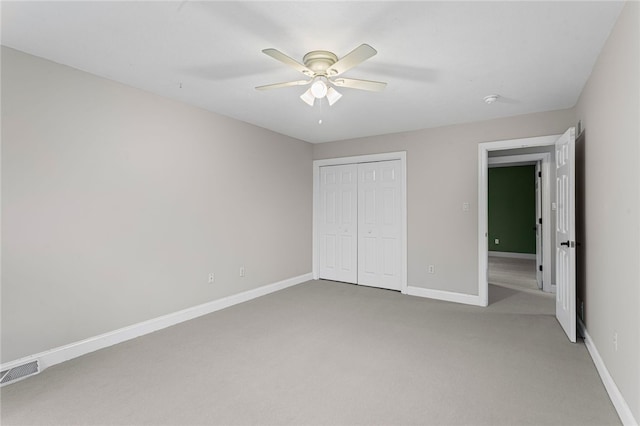 103 Ridgemont Dr, Cranberry Twp, PA 16066 - unfurnished bedroom featuring light colored carpet, a closet, baseboards, and a ceiling fan