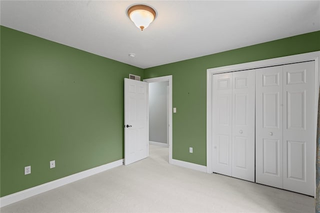 103 Ridgemont Dr, Cranberry Twp, PA 16066 - unfurnished bedroom featuring light colored carpet, baseboards, and a closet