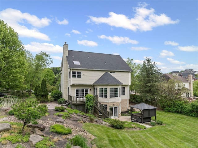 103 Ridgemont Dr, Cranberry Twp, PA 16066 - rear view of house with a hot tub, a patio area, a wooden deck, a yard, and stairs