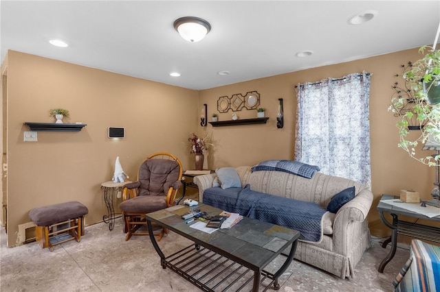 living room with concrete flooring and recessed lighting