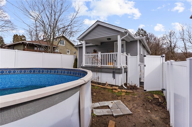 view of pool with a fenced backyard and a fenced in pool