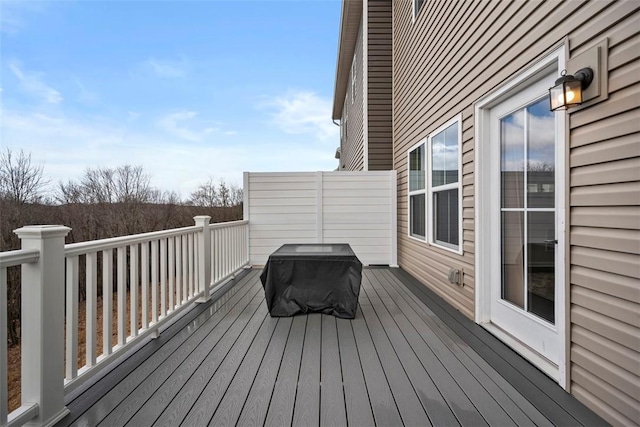 wooden terrace featuring area for grilling