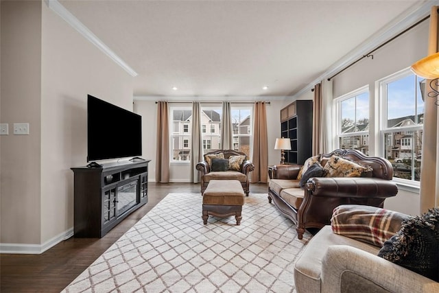 living room featuring recessed lighting, baseboards, crown molding, and wood finished floors