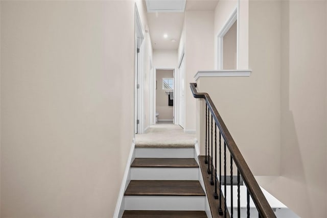 stairs featuring recessed lighting and baseboards