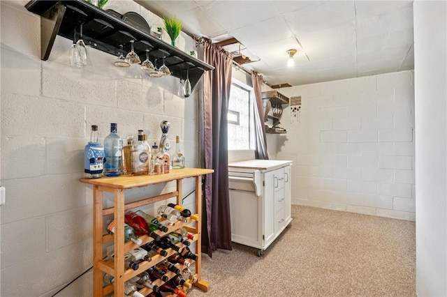 interior space featuring concrete block wall