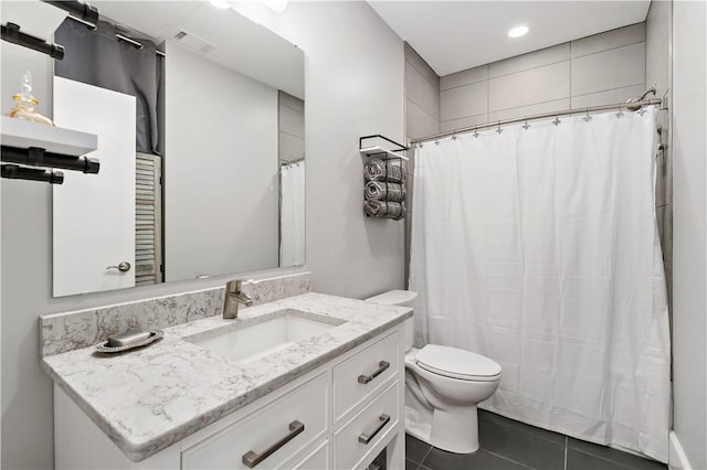 full bath with curtained shower, toilet, vanity, visible vents, and tile patterned floors