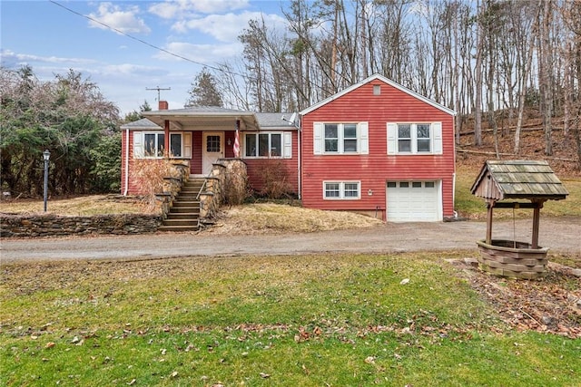 view of front of home featuring a garage, a chimney, and dirt driveway