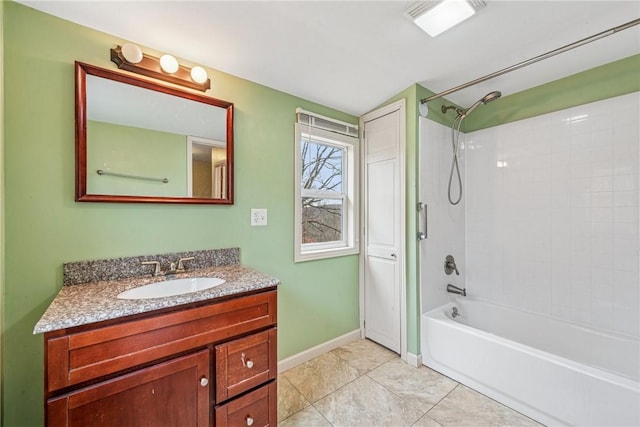 bathroom with visible vents, vanity,  shower combination, baseboards, and tile patterned floors