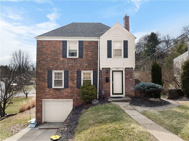 view of front facade with an attached garage, brick siding, driveway, a front lawn, and a chimney