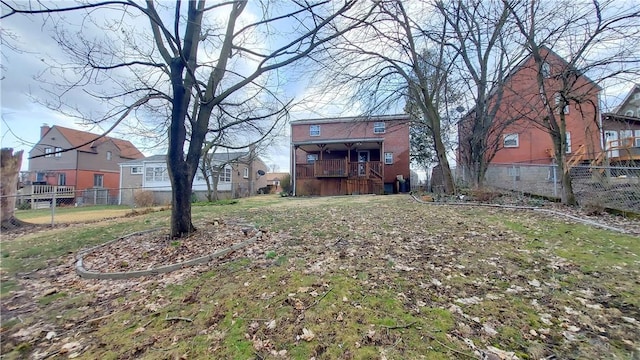 view of yard with fence and a residential view