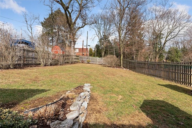 view of yard featuring a fenced backyard