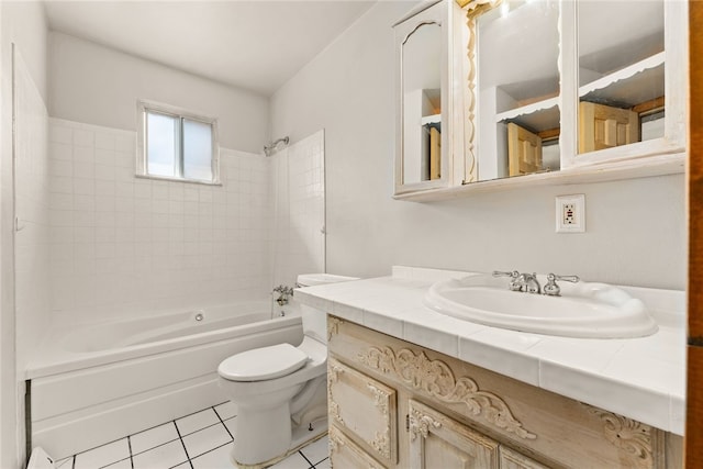 bathroom with shower / washtub combination, tile patterned flooring, vanity, and toilet