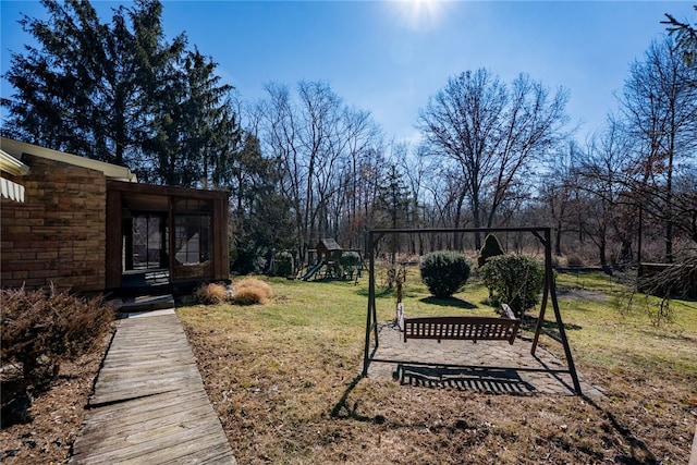 view of yard featuring a playground