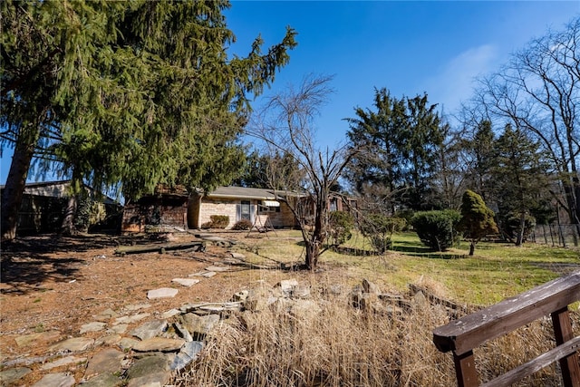 view of yard featuring fence