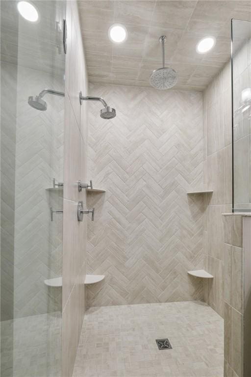 full bathroom with a stall shower and recessed lighting