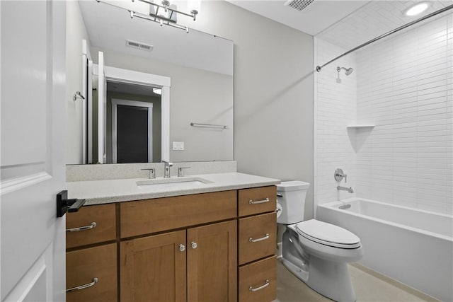 full bathroom with visible vents, vanity, toilet, and tub / shower combination