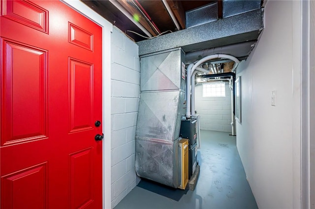 hallway with concrete floors