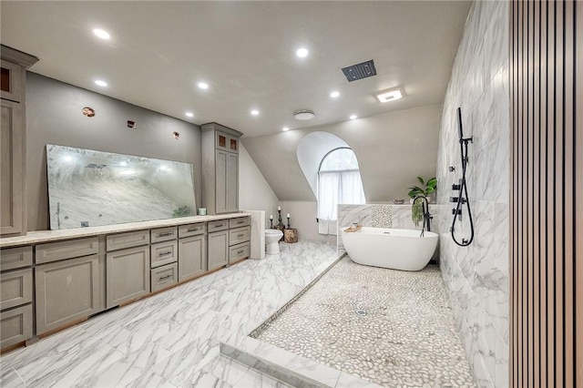 interior space with lofted ceiling, marble finish floor, visible vents, and recessed lighting