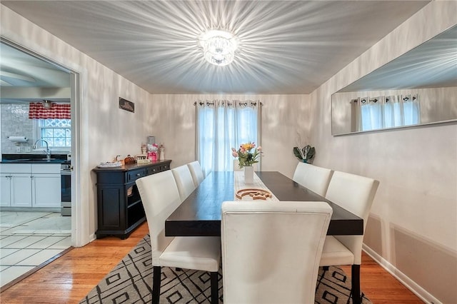 dining room featuring light wood-type flooring