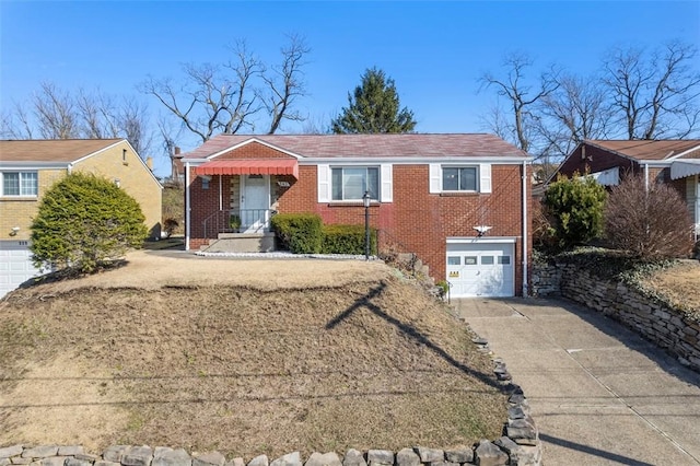 view of front of house featuring concrete driveway, brick siding, and an attached garage