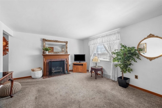 carpeted living room with a brick fireplace and baseboards