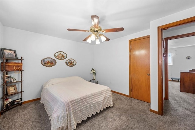 bedroom featuring carpet floors and baseboards