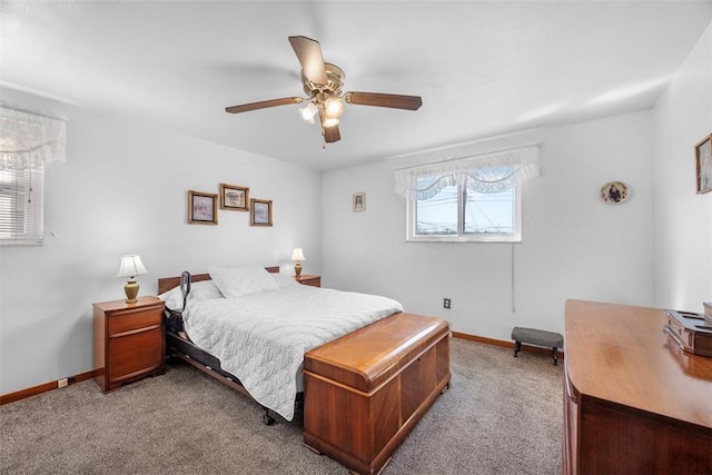 bedroom featuring ceiling fan, carpet floors, and baseboards