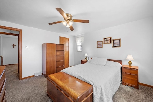 bedroom with carpet, visible vents, baseboards, and a ceiling fan