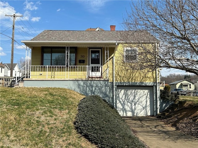 view of front of property featuring a front lawn, a porch, concrete driveway, an attached garage, and a shingled roof