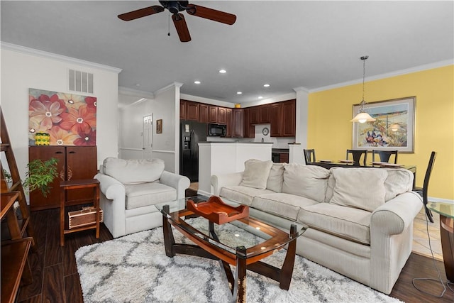 living area featuring visible vents, a ceiling fan, dark wood-style floors, crown molding, and recessed lighting