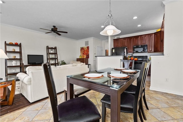 dining room with a ceiling fan, recessed lighting, crown molding, and baseboards