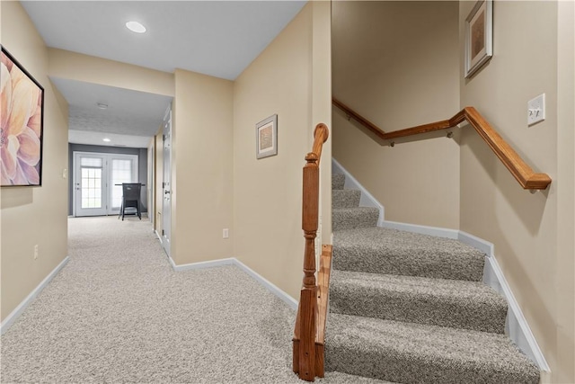 stairway with carpet floors, recessed lighting, and baseboards