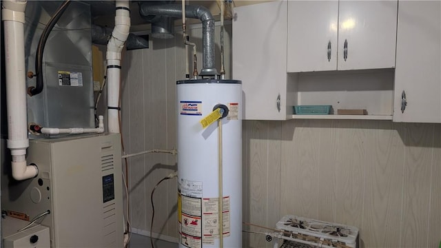 utilities featuring water heater and heating unit