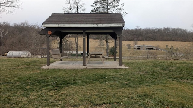 surrounding community featuring a patio area, a yard, and a gazebo