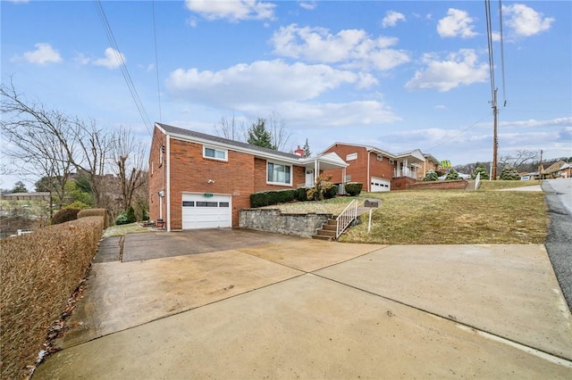 view of front facade with an attached garage, concrete driveway, and brick siding