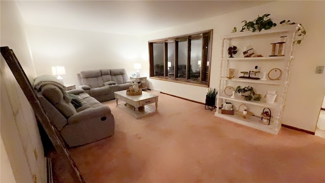 living area with carpet floors and baseboards