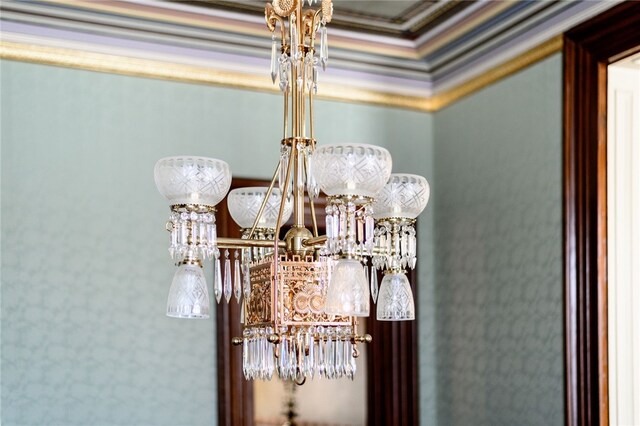 interior details featuring a notable chandelier