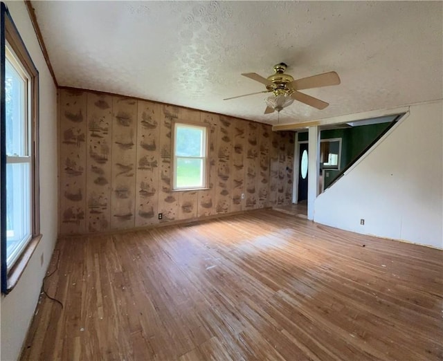 2343 Downing Ln, Hermitage, PA 16148 - empty room featuring wood finished floors, ceiling fan, and a textured ceiling